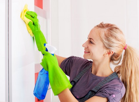 Professional cleaners working in a Barnes home interior