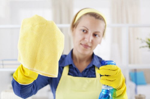 Airbnb cleaner preparing a Barnes short-let property for guests