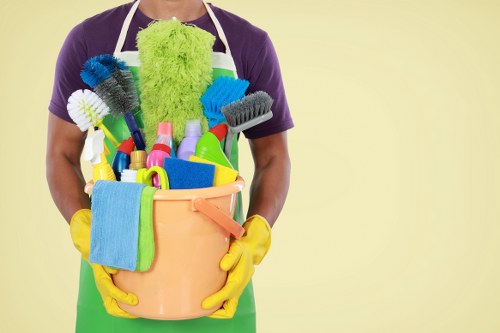 Local cleaners working in a Barnes property with careful attention to detail