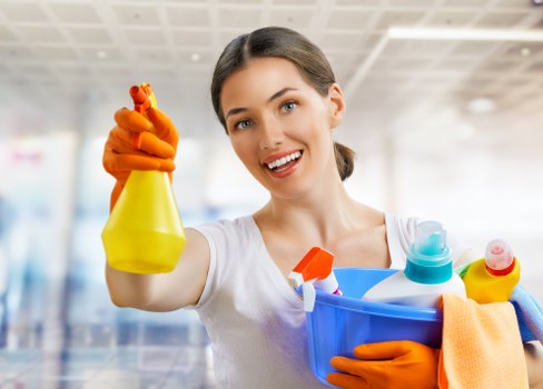 Trained cleaning staff using protective equipment in a property